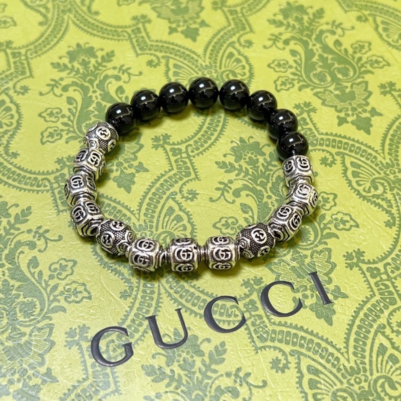 G*u*i bracelets